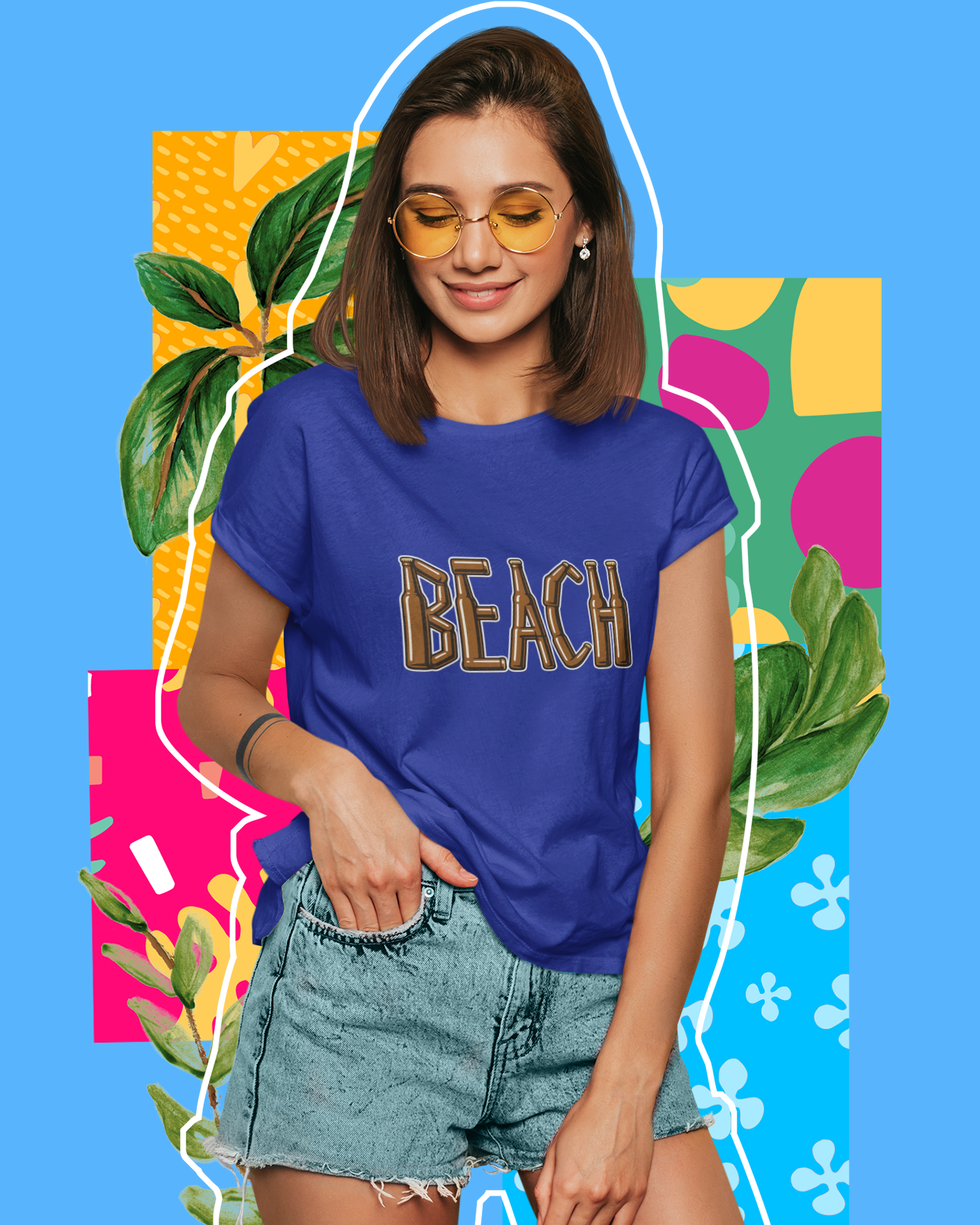 Woman wearing a blue 'BEACH' t-shirt with colorful abstract shapes and leaves on a blue background