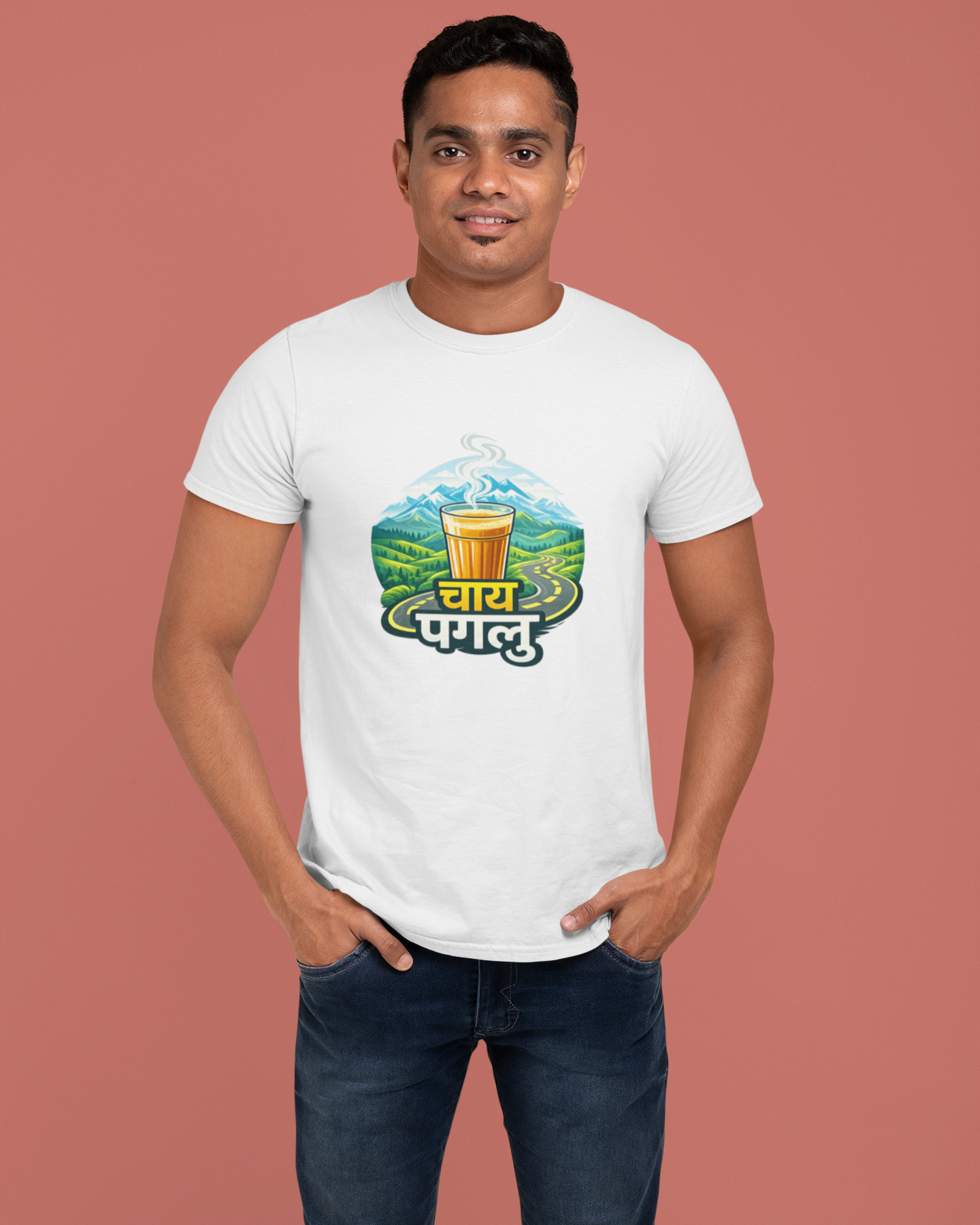 Man wearing a white t-shirt with a graphic design on a pink background