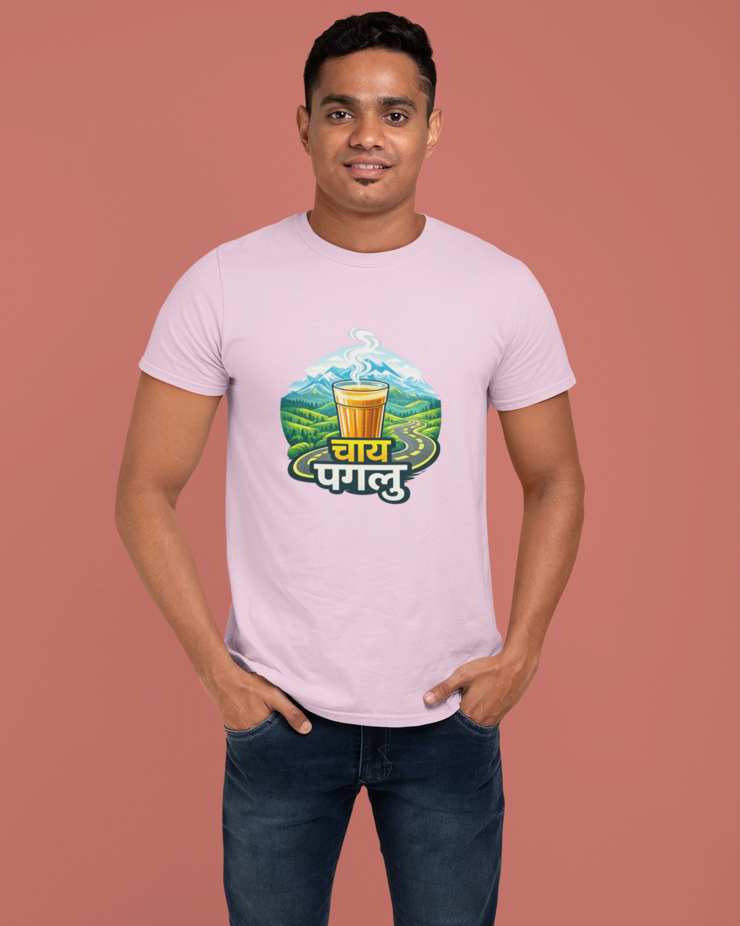 Man wearing a light pink t-shirt with a graphic design on a brown background