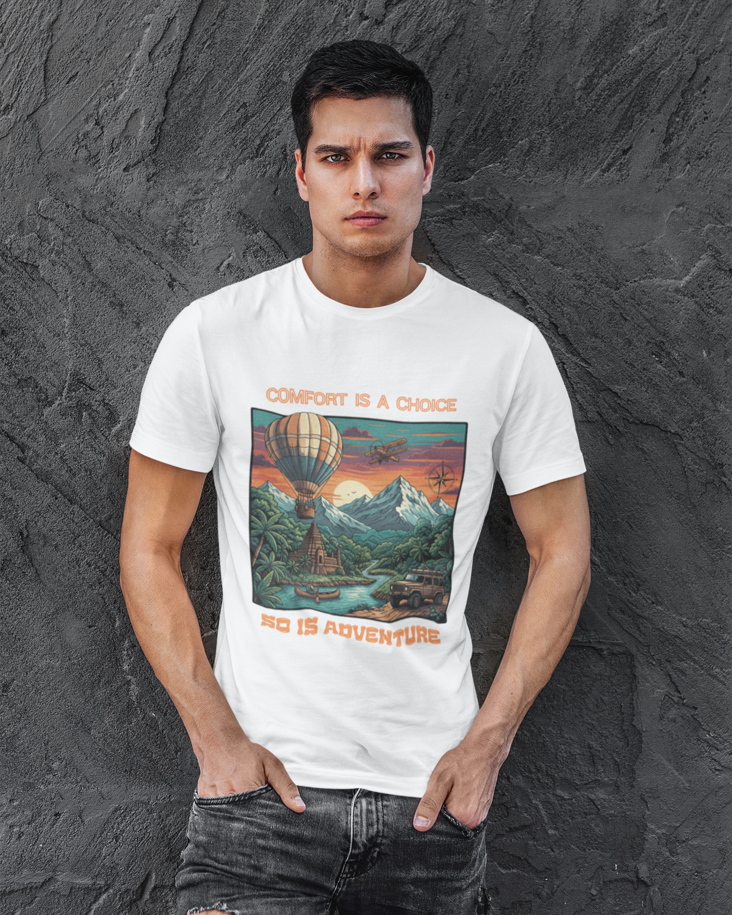 Man wearing a white t-shirt with a colorful graphic design against a textured gray background