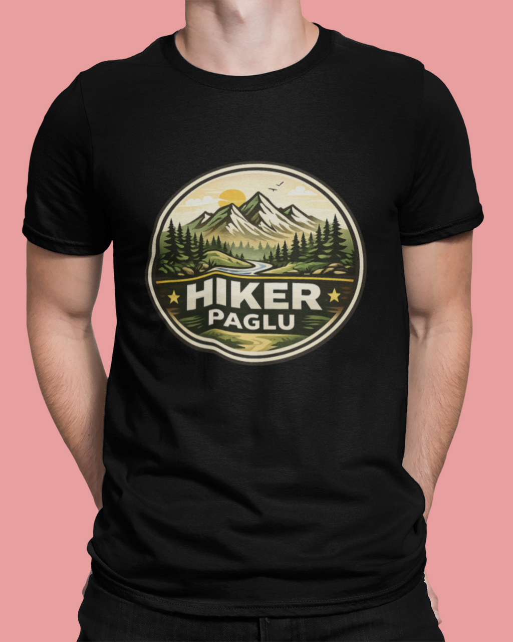 Black t-shirt with a mountain graphic and 'Hiker Paglu' text on a pink background