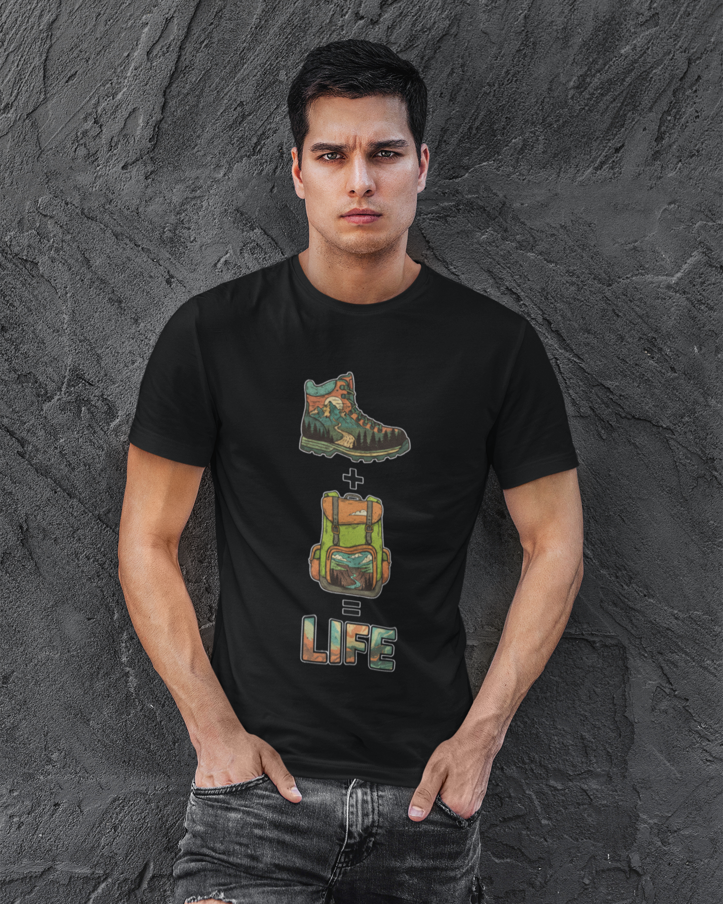 Man wearing a black t-shirt with graphic design against a textured gray background